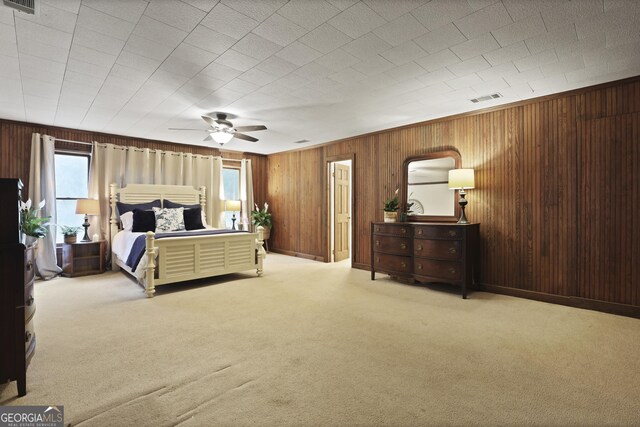 684 Frances Ln, Brooklet, GA 30415 - carpeted bedroom featuring wood walls and a ceiling fan