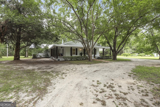 684 Frances Ln, Brooklet, GA 30415 - view of front of home with a porch and dirt driveway