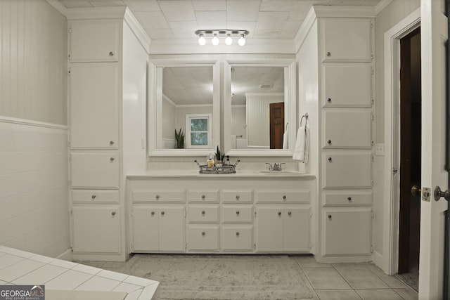 684 Frances Ln, Brooklet, GA 30415 - bathroom featuring tile patterned flooring, vanity, and ornamental molding