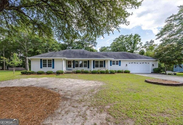 204 Old Oak Rd, Macon, GA 31216 - ranch-style house featuring driveway, an attached garage, and a front yard