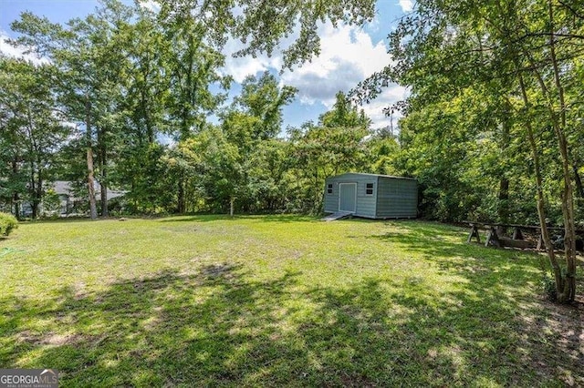 204 Old Oak Rd, Macon, GA 31216 - view of grassy yard featuring a storage shed