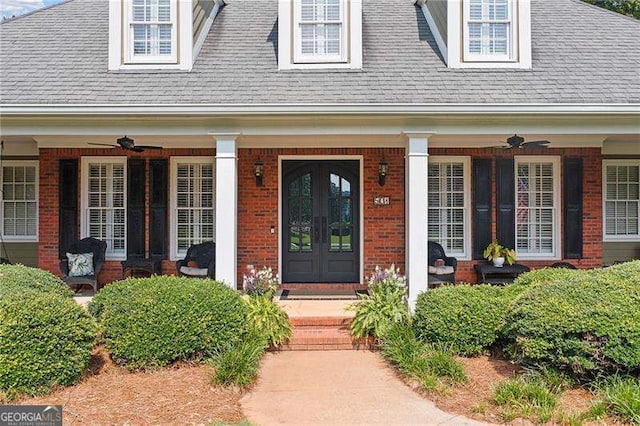 501 Avery Creek Pointe, Woodstock, GA 30188 - doorway to property featuring ceiling fan, brick siding, and a porch