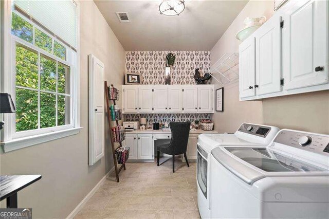 501 Avery Creek Pointe, Woodstock, GA 30188 - washroom with independent washer and dryer, cabinet space, plenty of natural light, and a desk