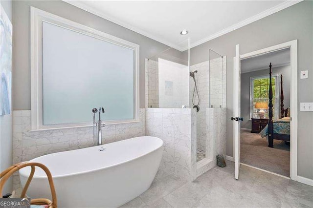 501 Avery Creek Pointe, Woodstock, GA 30188 - ensuite bathroom with a freestanding bath, a shower stall, tile walls, ornamental molding, and tile patterned flooring