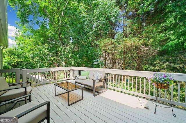 501 Avery Creek Pointe, Woodstock, GA 30188 - wooden deck with outdoor lounge area
