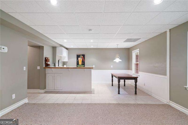 501 Avery Creek Pointe, Woodstock, GA 30188 - bar area with light tile patterned floors, recessed lighting, a paneled ceiling, light carpet, and wainscoting