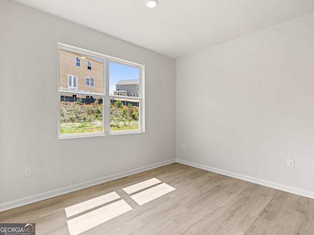 504 Oak View Ln, Dallas, GA 30157 - spare room featuring light wood-type flooring and baseboards