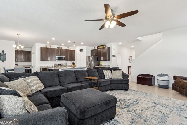 159 College St, Kingsland, GA 31548 - living area featuring a chandelier, light tile patterned flooring, a ceiling fan, and recessed lighting