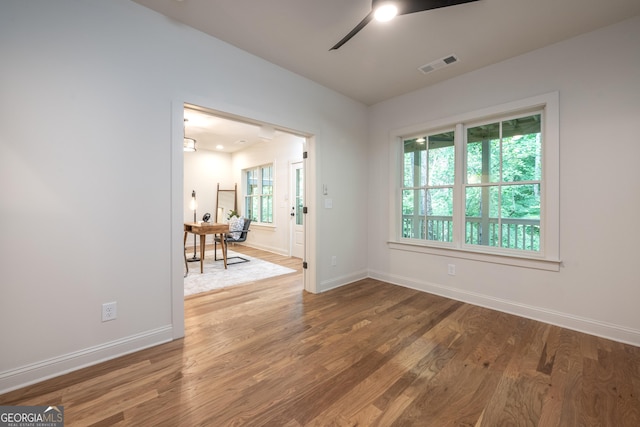 2164 James Aly, Atlanta, GA 30345 - unfurnished room with a ceiling fan and wood finished floors