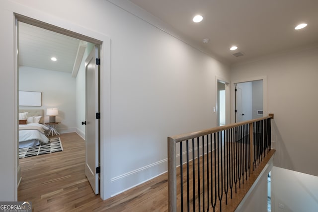 2164 James Aly, Atlanta, GA 30345 - corridor with wood finished floors, an upstairs landing, and recessed lighting