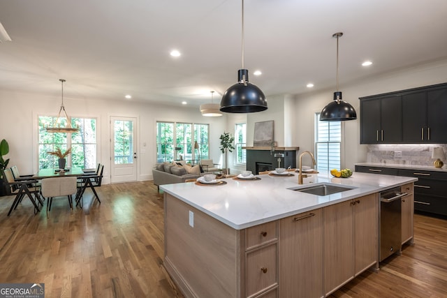 2164 James Aly, Atlanta, GA 30345 - kitchen with wood finished floors, open floor plan, an island with sink, recessed lighting, and backsplash