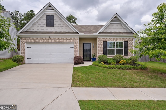 410 Meadowbend Cir, Athens, GA 30606 - view of front of home featuring driveway, a front lawn, brick siding, and a shingled roof