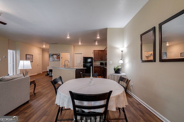 410 Meadowbend Cir, Athens, GA 30606 - dining space featuring baseboards and dark wood-type flooring