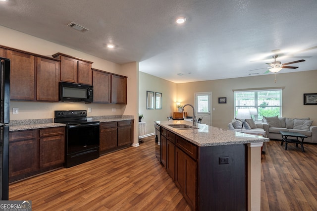 410 Meadowbend Cir, Athens, GA 30606 - kitchen featuring black appliances, dark wood finished floors, ceiling fan, open floor plan, and recessed lighting