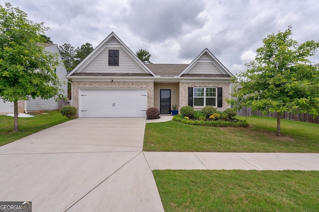 410 Meadowbend Cir, Athens, GA 30606 - view of front of house featuring brick siding, concrete driveway, and a front yard