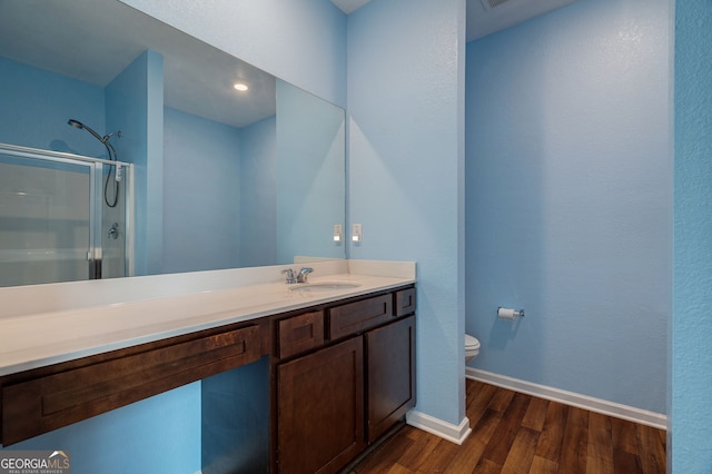 410 Meadowbend Cir, Athens, GA 30606 - bathroom featuring wood finished floors, a shower with door, and vanity
