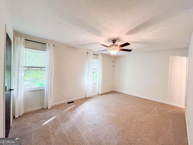 3150 Stratford Green Pl, Avondale Estates, GA 30002 - spare room with ceiling fan, carpet floors, and a textured ceiling