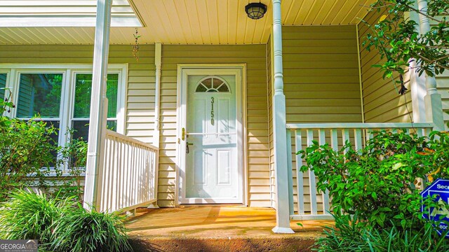 3150 Stratford Green Pl, Avondale Estates, GA 30002 - view of exterior entry featuring a porch