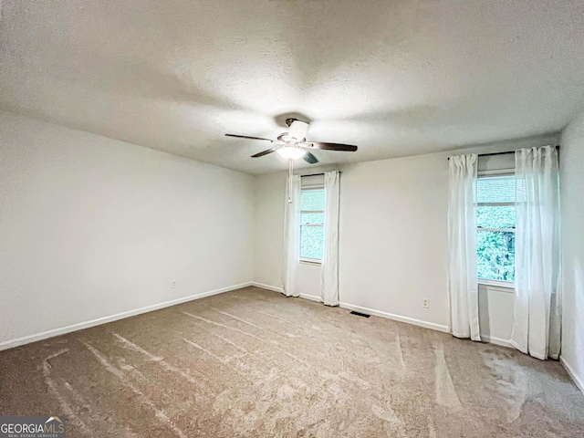 3150 Stratford Green Pl, Avondale Estates, GA 30002 - carpeted spare room featuring ceiling fan and a textured ceiling