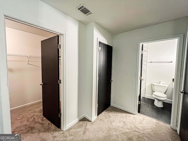 3150 Stratford Green Pl, Avondale Estates, GA 30002 - unfurnished bedroom with carpet flooring, a spacious closet, a closet, and ensuite bath