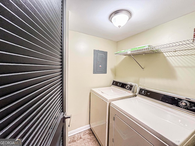 3150 Stratford Green Pl, Avondale Estates, GA 30002 - laundry area with electric panel, washer and clothes dryer, and light stone finish floors