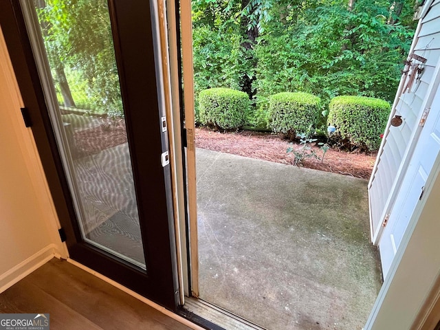 3150 Stratford Green Pl, Avondale Estates, GA 30002 - doorway featuring baseboards and wood finished floors