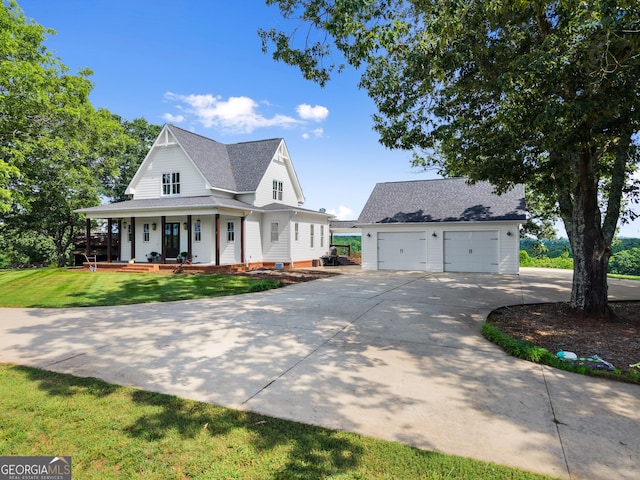 429 Hubert Harris Rd, Cornelia, GA 30531 - view of front of house featuring an outdoor structure, covered porch, a front lawn, concrete driveway, and roof with shingles