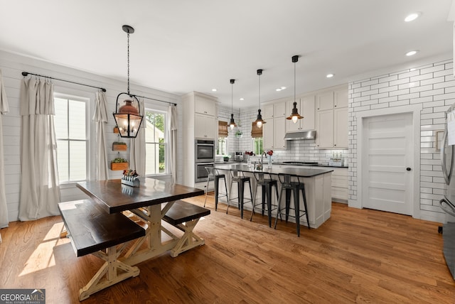429 Hubert Harris Rd, Cornelia, GA 30531 - dining room featuring light wood finished floors and recessed lighting