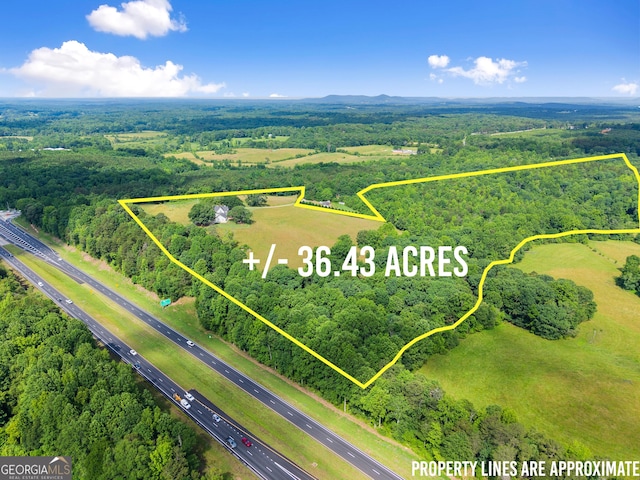 429 Hubert Harris Rd, Cornelia, GA 30531 - aerial view of property and surrounding area featuring a major roadway and property boundaries highlighted