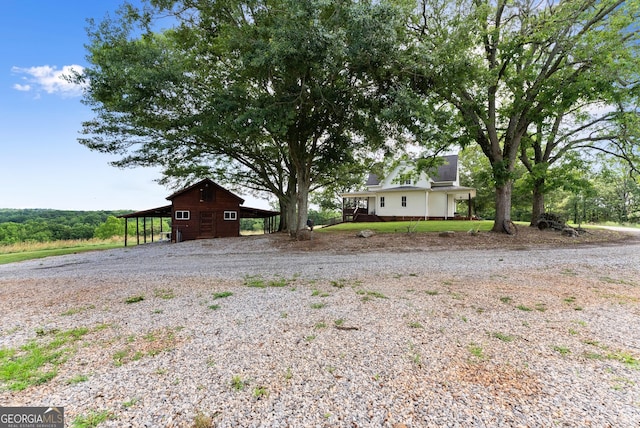 429 Hubert Harris Rd, Cornelia, GA 30531 - view of yard featuring gravel driveway and an outdoor structure