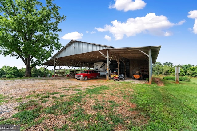 429 Hubert Harris Rd, Cornelia, GA 30531 - view of parking with a pole building, a detached carport, and driveway