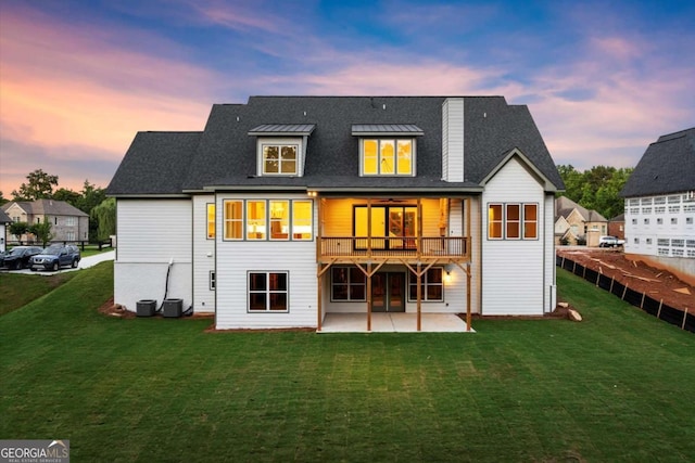 6750 Pannell Rd, Buford, GA 30518 - back of property with a patio, a lawn, and a chimney