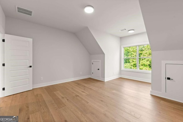 6750 Pannell Rd, Buford, GA 30518 - bonus room with wood finished floors and vaulted ceiling