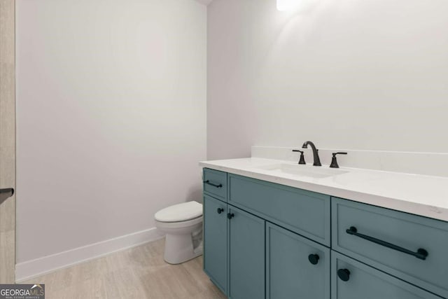6750 Pannell Rd, Buford, GA 30518 - bathroom with vanity and wood finished floors