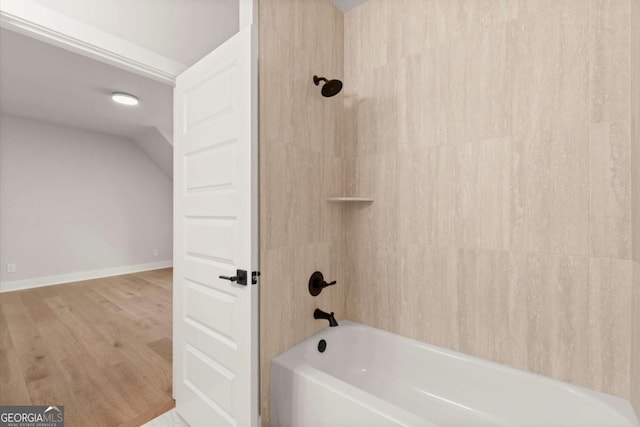 6750 Pannell Rd, Buford, GA 30518 - full bath with shower / washtub combination and wood finished floors