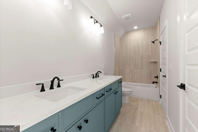 6750 Pannell Rd, Buford, GA 30518 - full bathroom featuring double vanity, washtub / shower combination, and recessed lighting