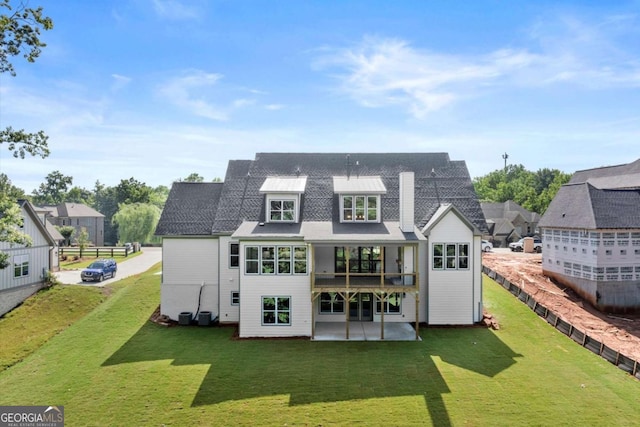 6750 Pannell Rd, Buford, GA 30518 - rear view of house with a patio area, a yard, a balcony, and a shingled roof