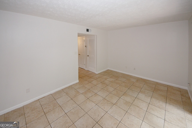 3101 Reeves St SE, Smyrna, GA 30080 - unfurnished room featuring a textured ceiling and baseboards