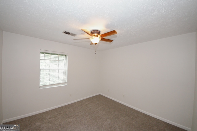 3101 Reeves St SE, Smyrna, GA 30080 - unfurnished room featuring a ceiling fan, carpet floors, and a textured ceiling