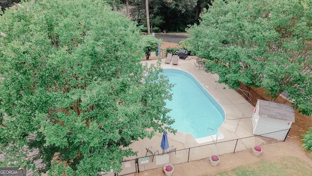 3101 Reeves St SE, Smyrna, GA 30080 - view of pool featuring a patio and view of scattered trees