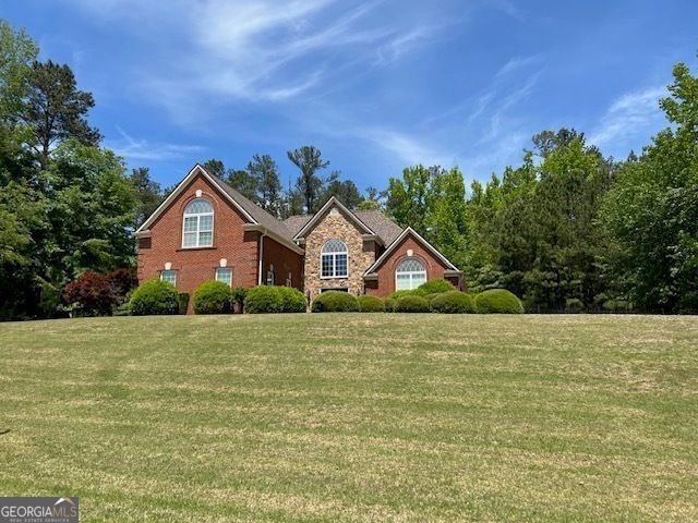 1209 Persimmon Way, Mcdonough, GA 30252 - view of front of house featuring a front yard