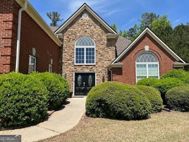 1209 Persimmon Way, Mcdonough, GA 30252 - view of front facade with stone siding