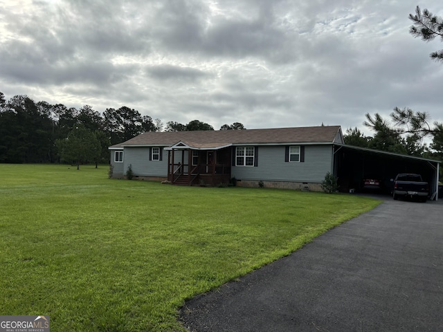 7191 Moontown Rd, Appling, GA 30802 - view of front of home with crawl space, a carport, a front yard, and driveway