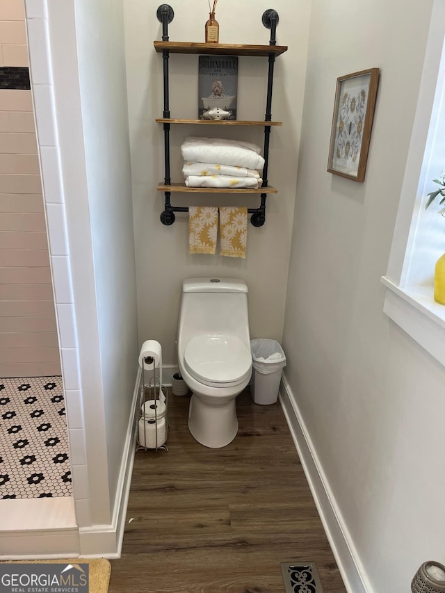 7191 Moontown Rd, Appling, GA 30802 - full bath with a shower stall and wood finished floors