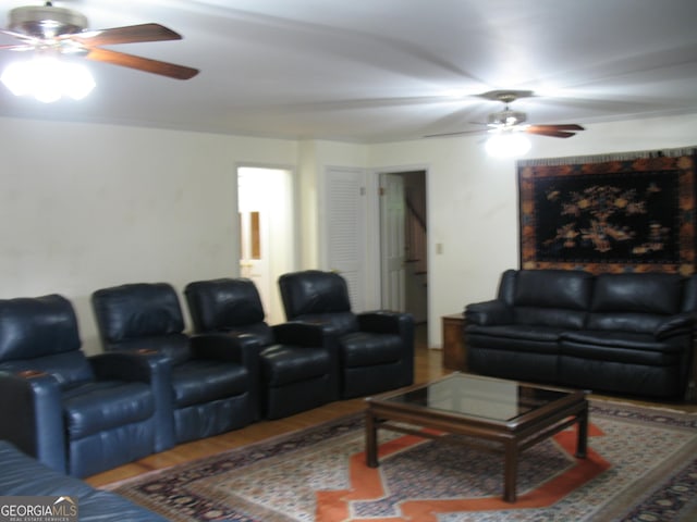 4098 Nancy Creek Way NE, Brookhaven, GA 30319 - cinema room featuring a ceiling fan and wood finished floors