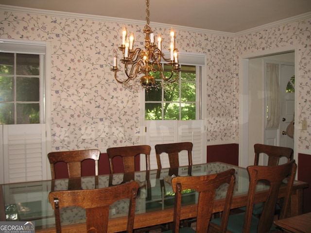 4098 Nancy Creek Way NE, Brookhaven, GA 30319 - dining area featuring a chandelier, crown molding, and wallpapered walls