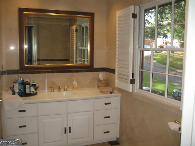 4098 Nancy Creek Way NE, Brookhaven, GA 30319 - bathroom featuring tile walls and vanity