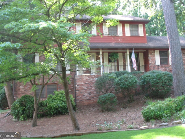 4098 Nancy Creek Way NE, Brookhaven, GA 30319 - view of front of home with brick siding and a porch