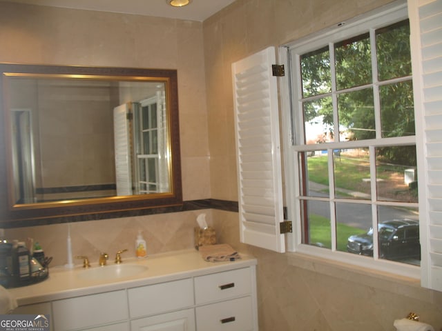 4098 Nancy Creek Way NE, Brookhaven, GA 30319 - bathroom featuring vanity and tile walls