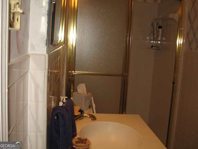 4098 Nancy Creek Way NE, Brookhaven, GA 30319 - bathroom with a shower with shower door and vanity